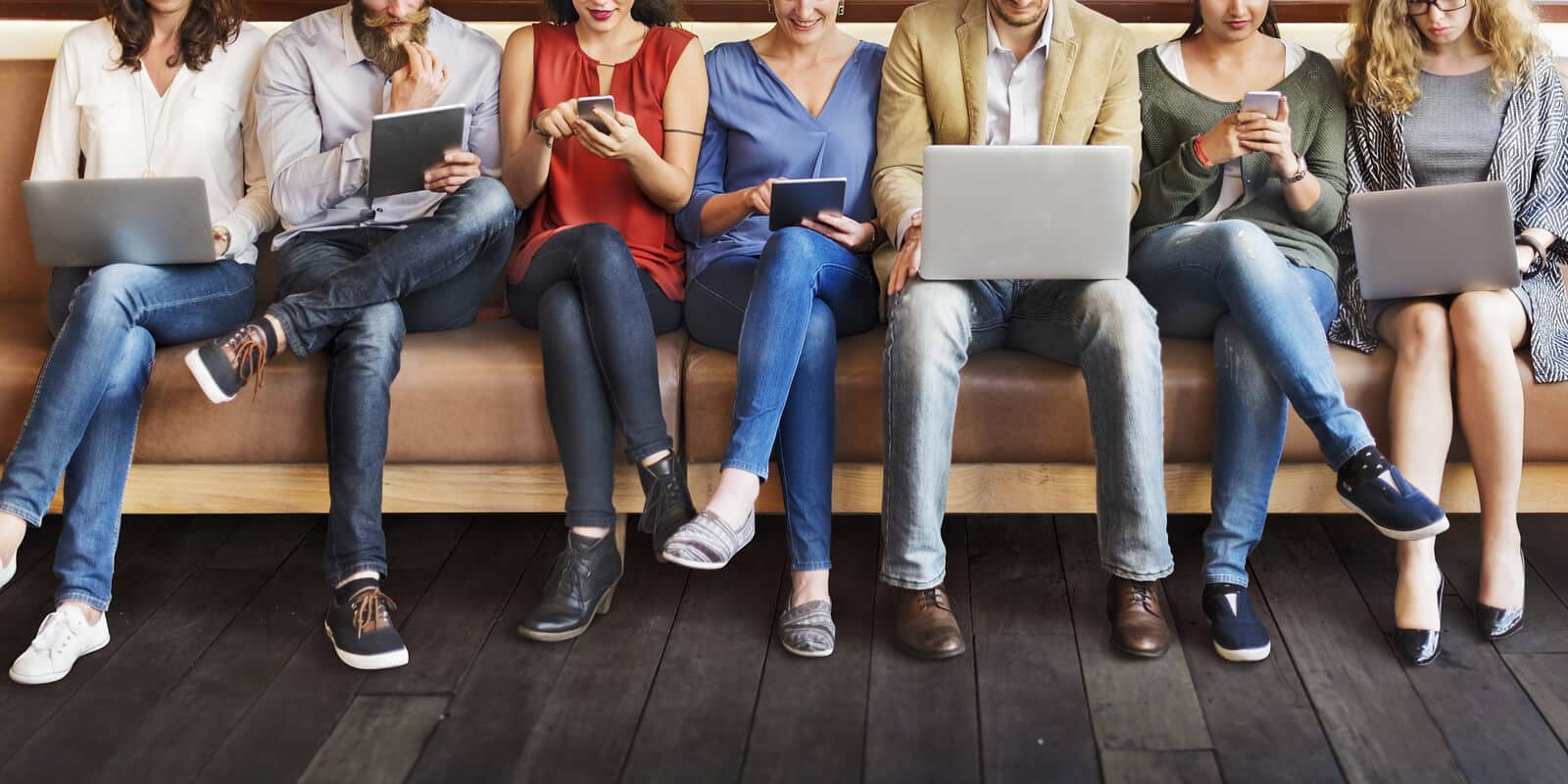 people on laptops and mobie devices