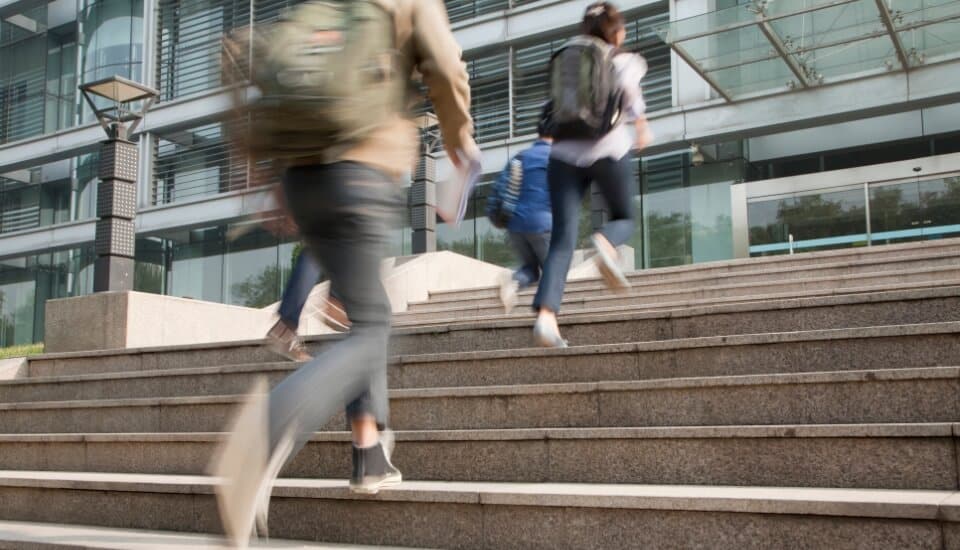 people running up steps quickly to illustrate site speed