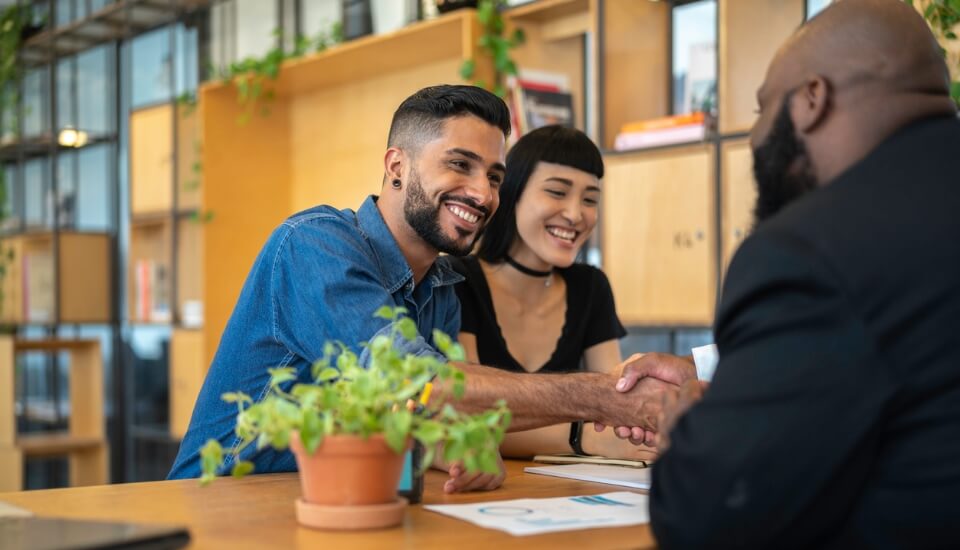 financial planners talking to an editor for an online publication