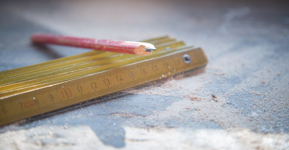 folding ruler and pencil