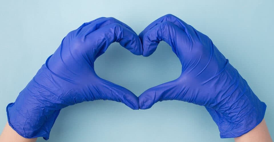 medical gloves making heart shape