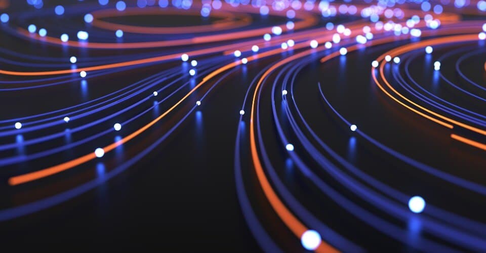 blue, orange and pink lines on a dar background with white spots