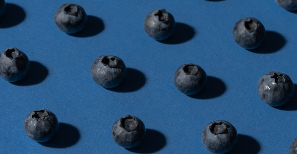 cluster of blueberries arranged in a pattern
