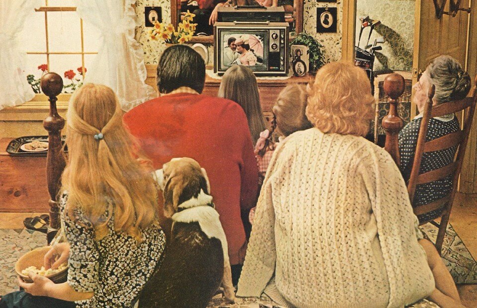 Sony Trinitron ad of a family huddled in front of a small TV in 1971