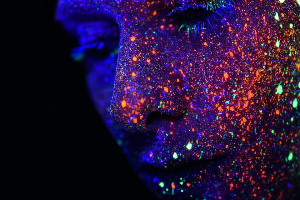 Person with dots on their face to represent internet touch points.