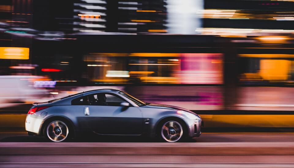 image of a car   driving accelerated  with blurred background