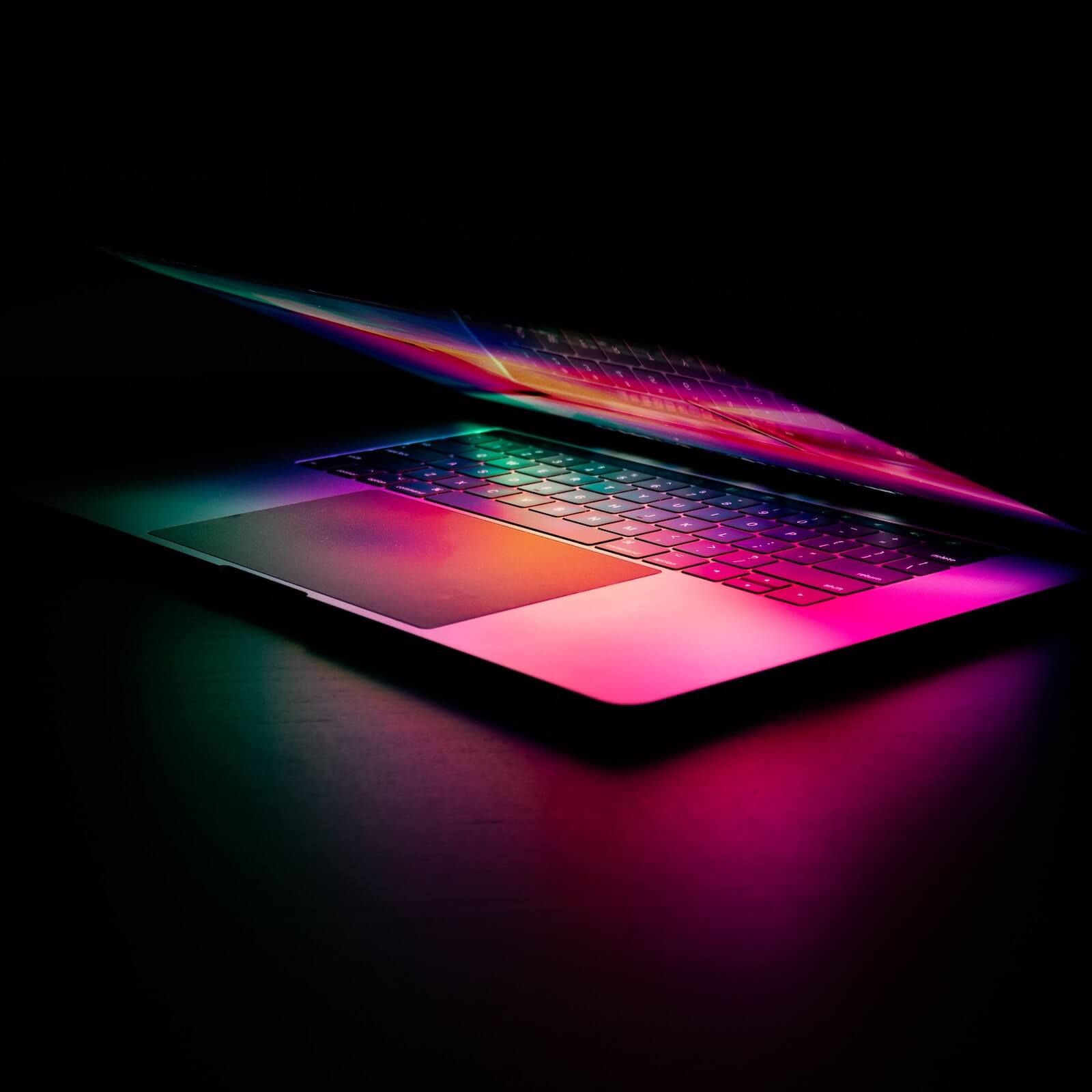 Laptop against a black background