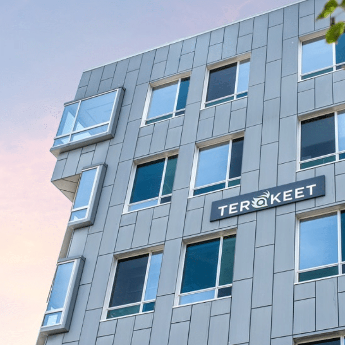 A building's exterior with a sign reading "Terakeet"